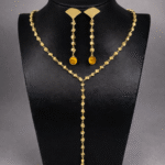 Yellow gold with topaz drop set