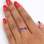 Yellow gold with purple stone