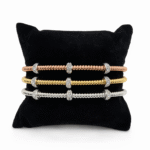 Trio ;  white, yellow and rose gold Lia bangle set